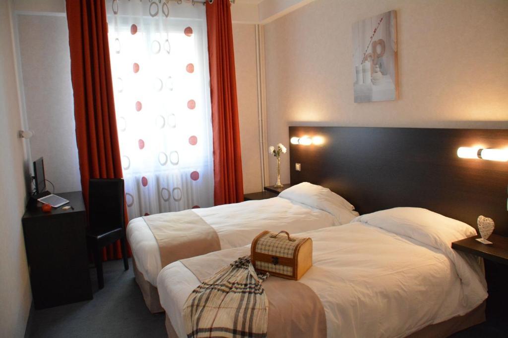 Logis Hotel Restaurant De France Saint-Geniez-d'Olt Bilik gambar